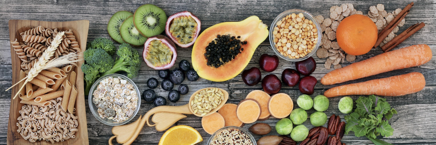 A spread of healthy fruits, vegetables, and grains