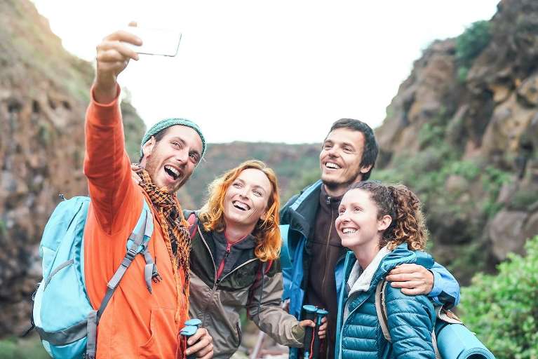 A group of friends hiking in the mountains