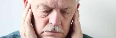 An older man with tooth pain | cavities Corona, CA
