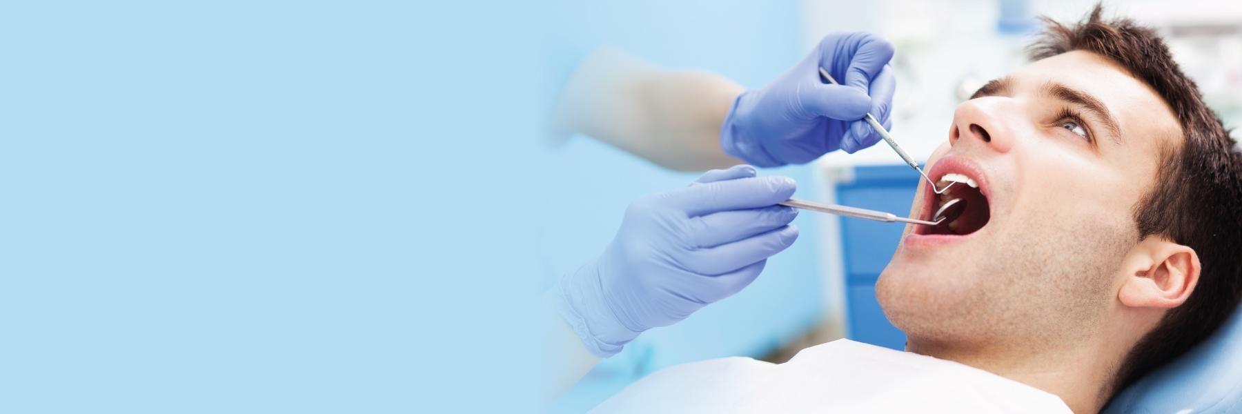 Patient at dentist visit for periodontal disease treatment