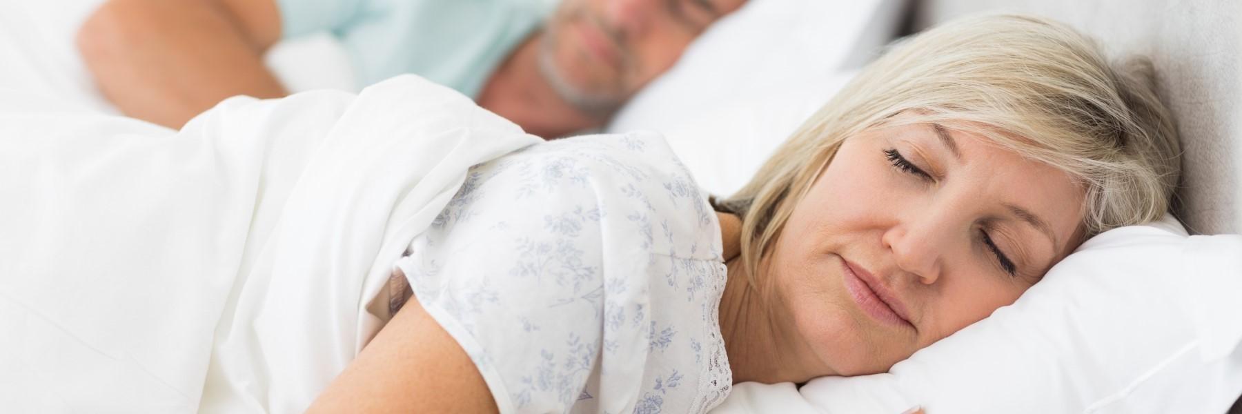 Woman soundly sleeping after sleep apnea treatment