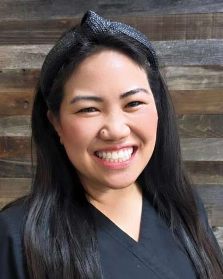 Reina Wong, a registered dental hygienist at Dental Care of Corona